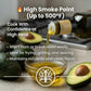Olive oil being poured into a bowl with avocados